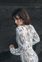 Load image into Gallery viewer, Back side view of bride showcasing fabric detail of lace sophisticated wedding dress.