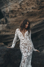 Load image into Gallery viewer, Vancouver bride leaning on rock in lace bridal gown.