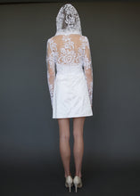 Load image into Gallery viewer, Model facing away, full length, in above knee wedding dress with cowl neck lace bolero jacket.