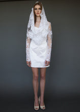 Load image into Gallery viewer, Model standing, in short wedding dress and lace cropped jacket.