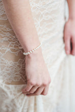 Load image into Gallery viewer, Mermaid style backless wedding dress with cross straps and sheath skirt