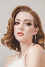 Load image into Gallery viewer, A unique short wedding dress in white for the high fashion bride.