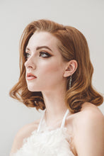 Load image into Gallery viewer, A high neck mini dress made from 3D silk to look like feathers, inspired by French fashion.