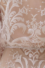 Load image into Gallery viewer, Detail shot of lace on back of vancouver bride showing unusual embroidery for unique wedding dresses.