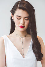 Load image into Gallery viewer, A white crepe boho chic wedding dress with thick straps and low neck wedding dress made in Vancouver.