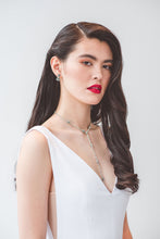 Load image into Gallery viewer, A simple wedding dress made from french stretch crepe featuring a sexy low V back and mesh side cut out uniquely made in Vancouver.