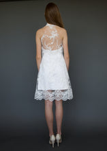 Load image into Gallery viewer, Model facing away, wearing low back with lace short wedding dress.