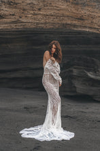 Load image into Gallery viewer, Vancouver wedding dress shot in Bali of model standing while showing off shoulder in lace wedding dress.