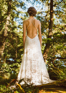 A unique backless lace wedding dress handmade in Vancouver. 