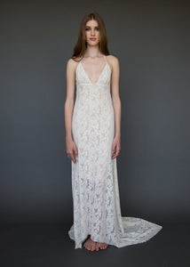 A sexy low V neck open back lace bridal gown made in Vancouver. 