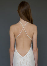 Load image into Gallery viewer, A strappy cross over backless lace bridal gown uniquely made in Vancouver.