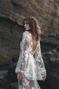 Back of Vancouver bride in low back lace wedding dress with hippie sleeves.