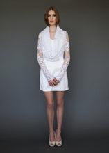 Load image into Gallery viewer, Model standing facing us, in long sleeve lace bridal jacket with draped neckline.
