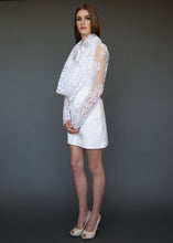 Load image into Gallery viewer, Model standing to the side, full length, wearing corded lace fashionable bolero.
