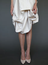 Load image into Gallery viewer, Close up of skirt of hand draped silk short wedding dress.
