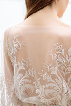 Load image into Gallery viewer, Detail shot of back of illusion neckline on this romantic wedding dress for boho brides.
