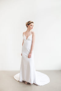 A modern lace up backless wedding dress handmade in Vancouver
