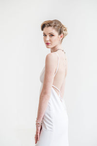 A chic corset lace up back wedding dress in crepe.