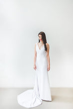 Load image into Gallery viewer, A minimalist chic sleeveless wedding dress with fit and flare skirt for the modern boho bride.
