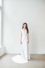Load image into Gallery viewer, A boho chic wedding dress with sexy low V neckline, natural waist, and long train made in Vancouver.
