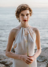 Load image into Gallery viewer, Drapey halter wedding dress close-up of bride with flowers in Vancouver.
