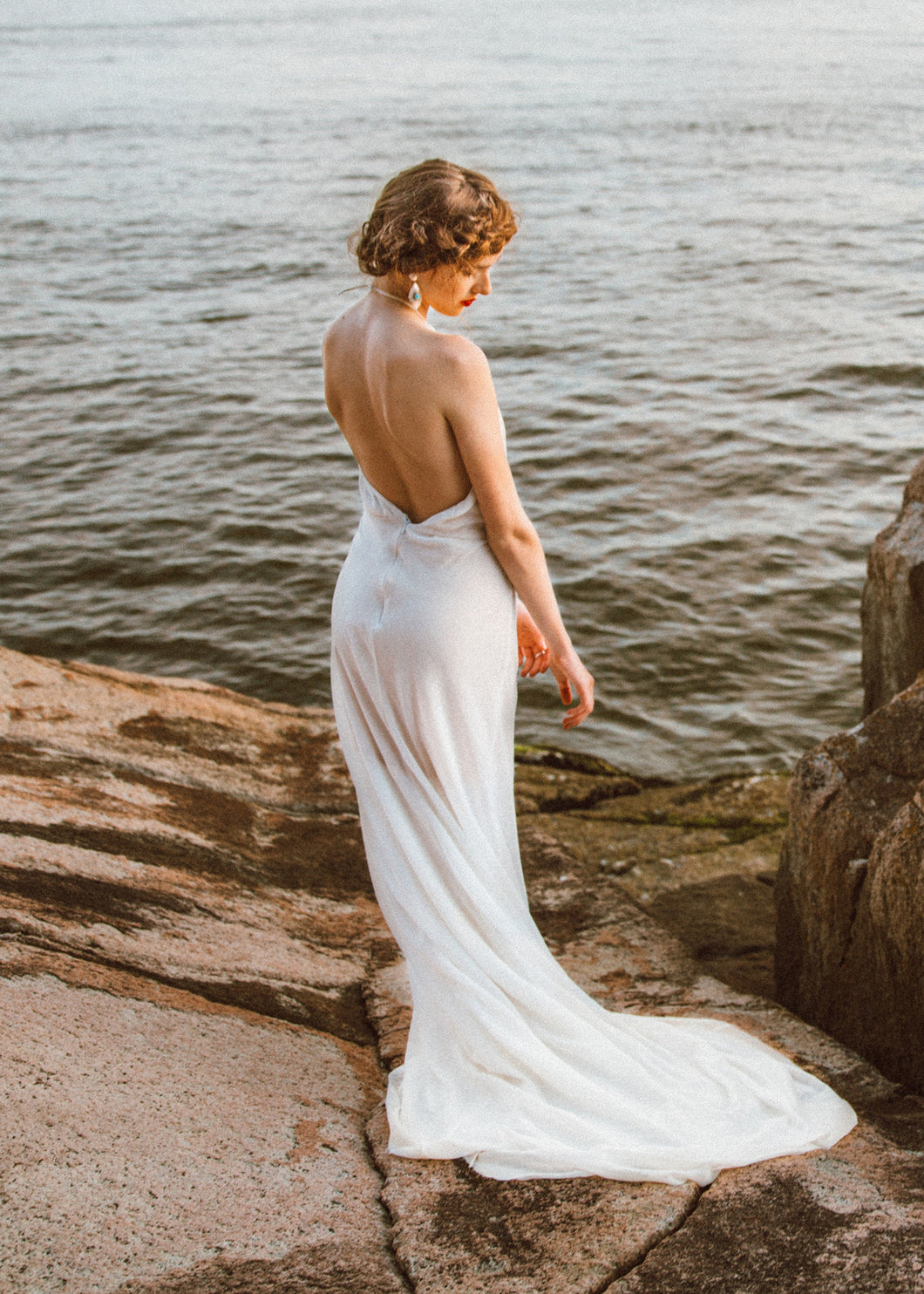 Back view of low back sheath wedding dress on Vancouver bride.