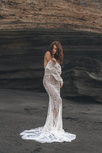 Load image into Gallery viewer, Vancouver wedding dress shot in Bali of model standing while showing off shoulder in lace wedding dress.
