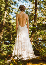 Load image into Gallery viewer, A unique backless lace wedding dress handmade in Vancouver. 
