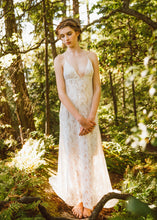 Load image into Gallery viewer, A unique low neck backless lace wedding dress made in Vancouver. 
