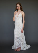 Load image into Gallery viewer, A low V backless lace bridal gown for the sexy boho bride.
