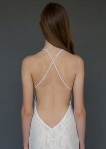 A strappy cross over backless lace bridal gown uniquely made in Vancouver. 